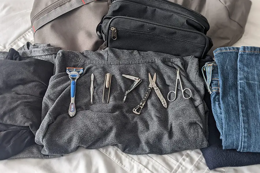 Can I take tweezers, scizzors, razors or nail clippers on a plane?